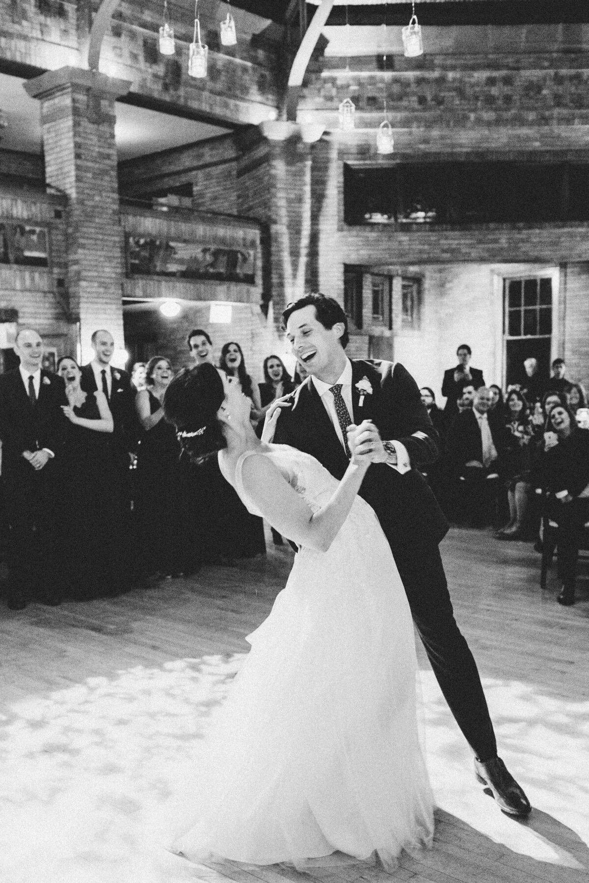 A black and white first dance photo at Cafe Brauer