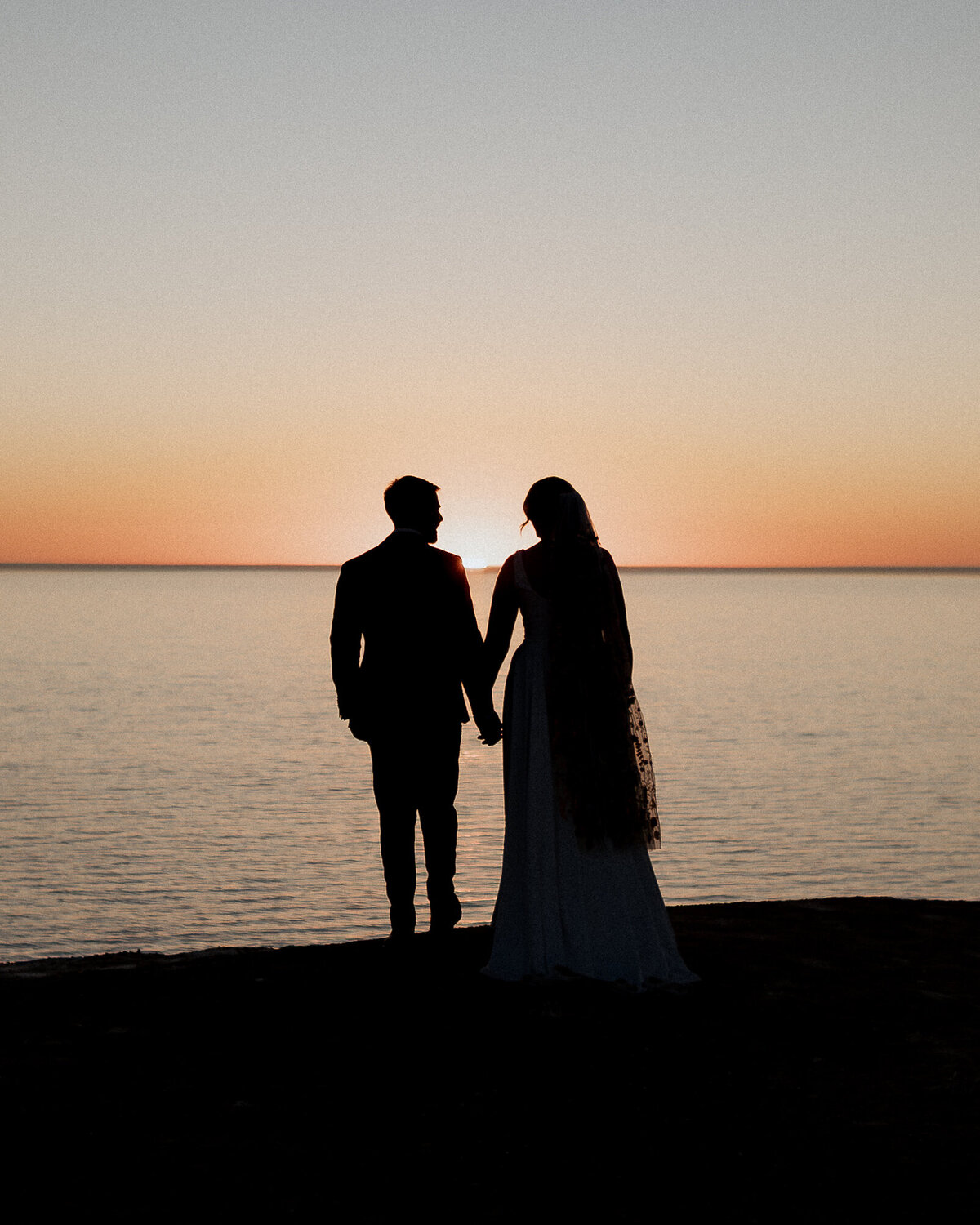 Candid shots of the bride preparing for her big day in Adelaide, captured by JakeyVass Media.