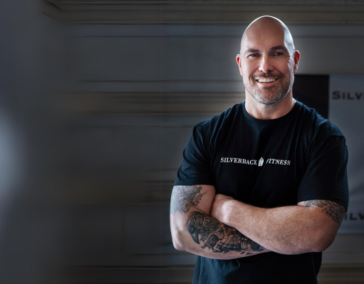 Headshot image of Sarnia's best personal trainer Jim Stewart of Silverback fitness posing in his gym.