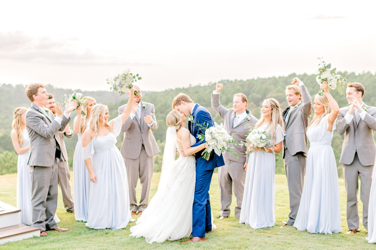 picture of bridal party having fun at sunset taken by Tuscaloosa Wedding Photographer Emily McIntyre Photography