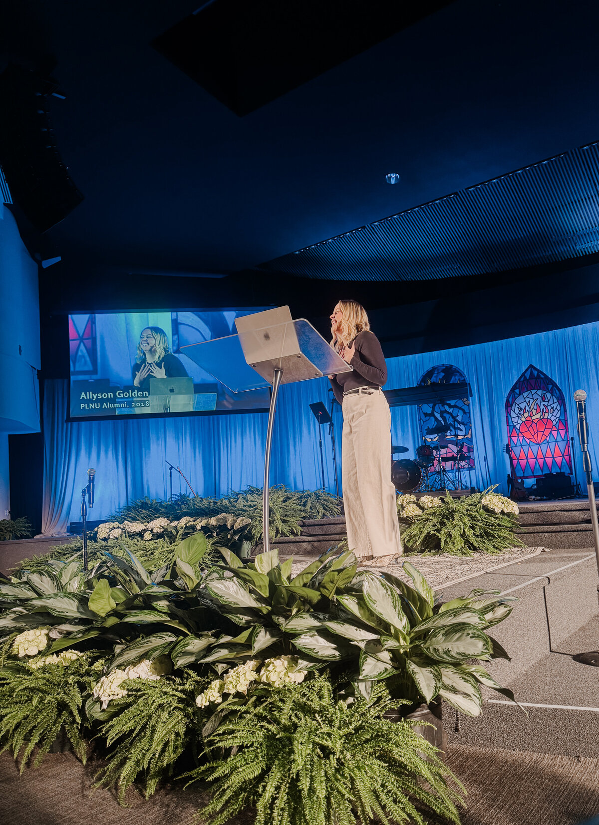 A photo of Allyson Golden preaching at Point Loma Nazarene University