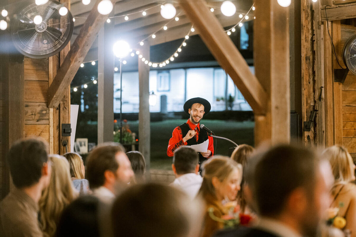man-in-cowboy-hat-giving-toast