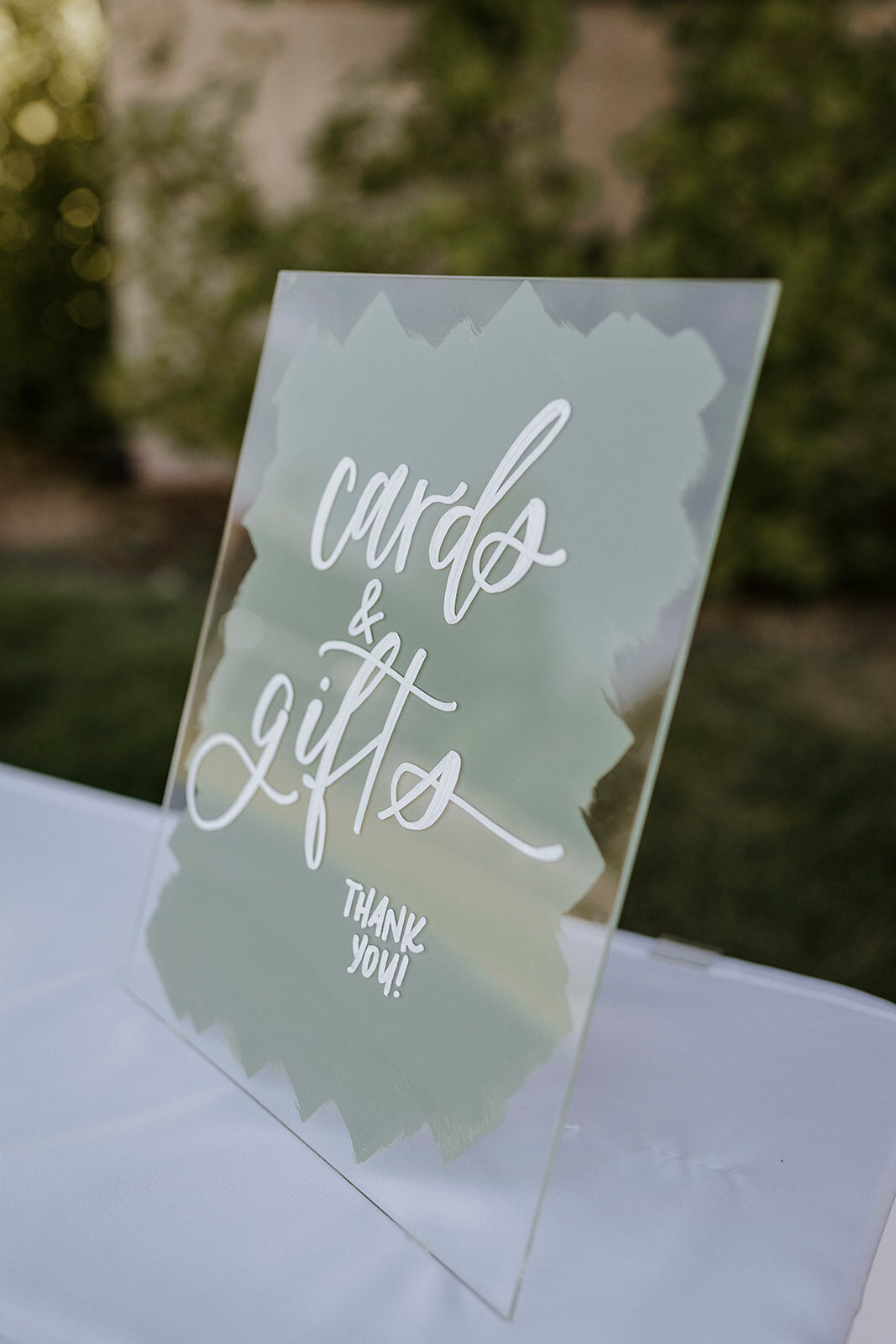 green brushback cards and gifts sign