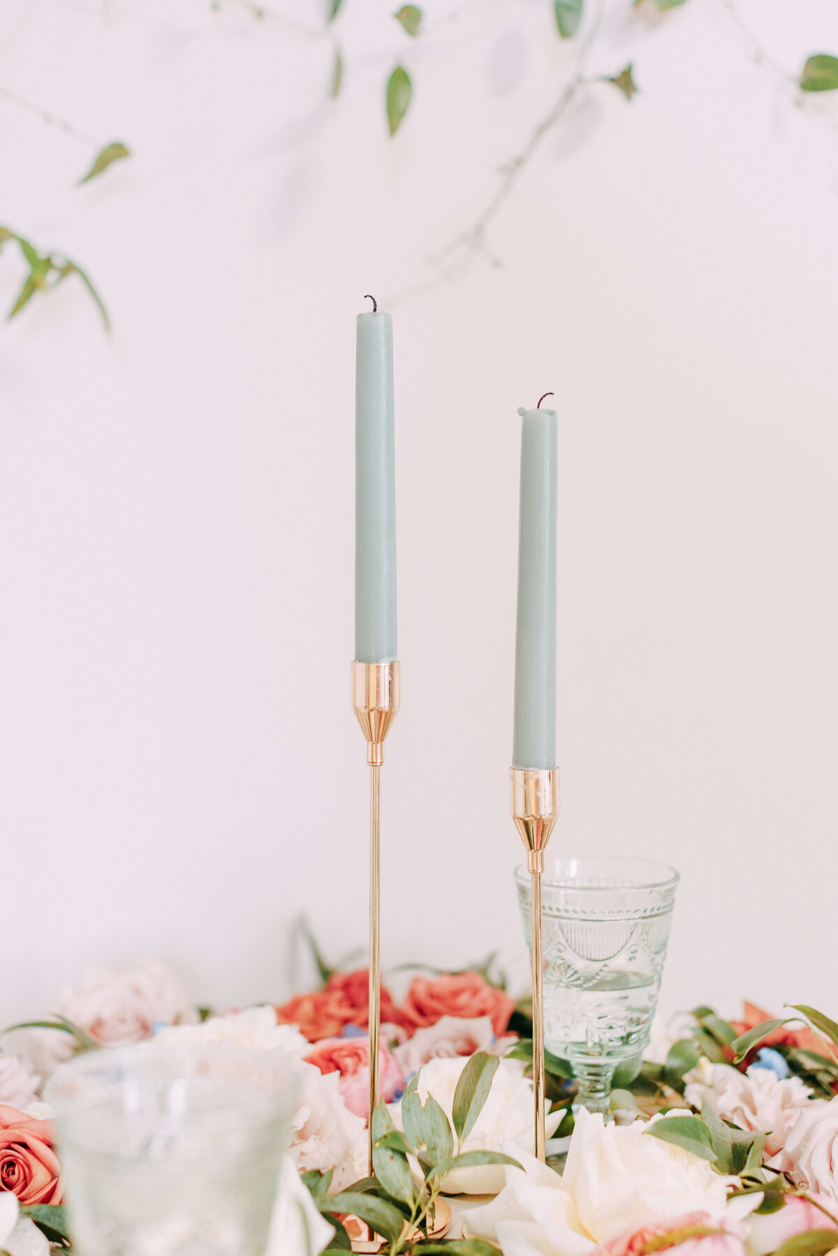 delicate blue candles on a wedding table