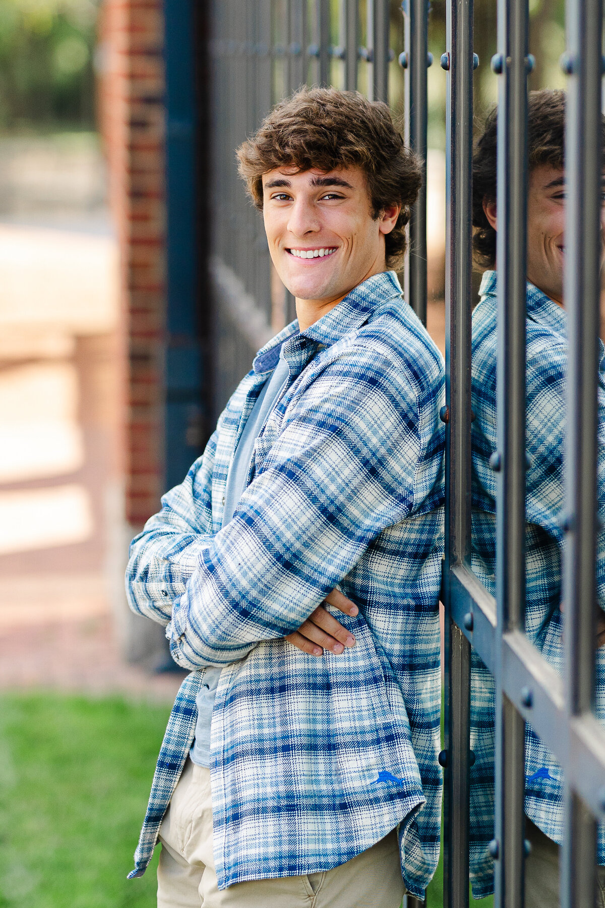 Senior guy portrait session in Columbus, Ohio, with a modern and urban outdoor setting.