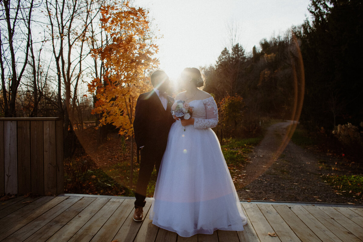 bridal-portrait-on-the-boardwalk-by-montmorency-falls-at-sunset-1