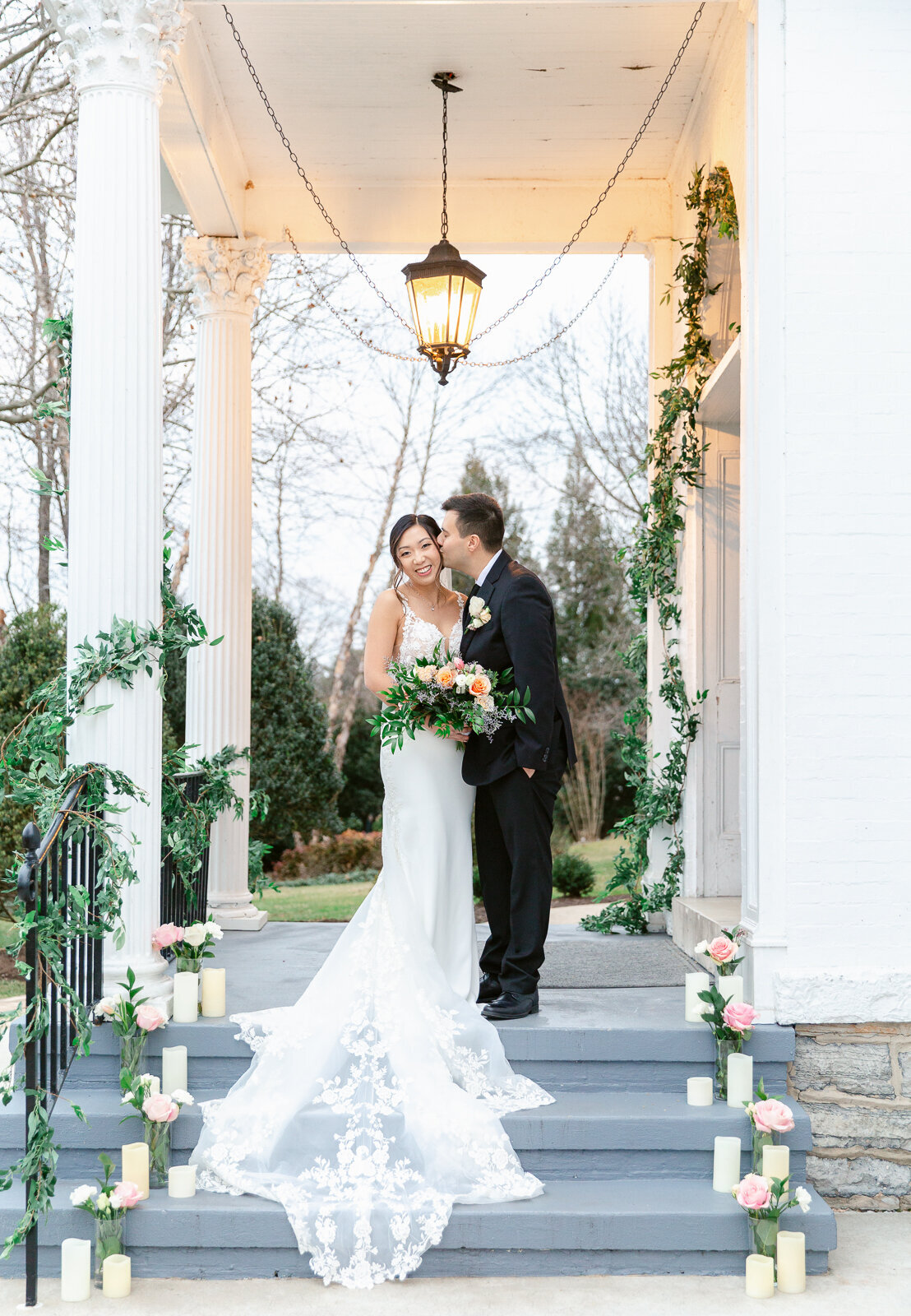 Bride and Groom on the steps at Ceresville Mansion in Frederick, Maryland. Capture by Bethany Aubre Photography.