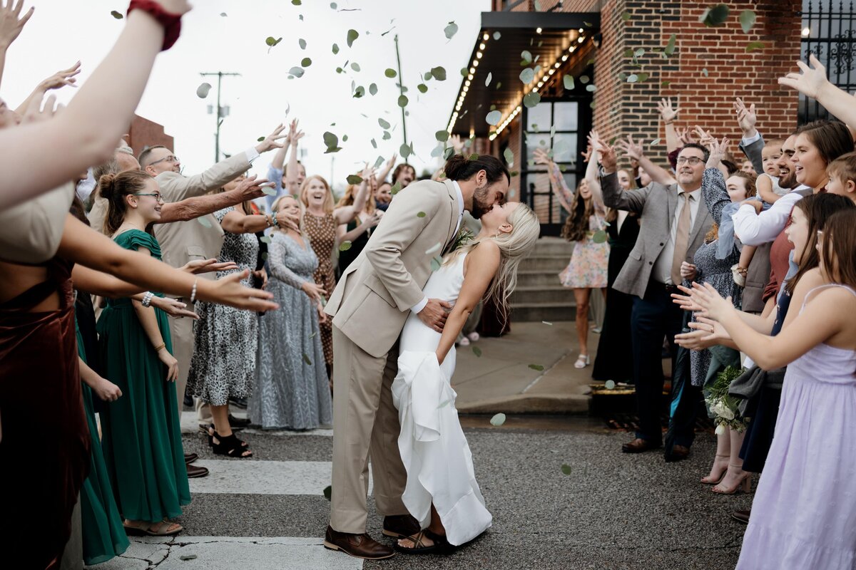 Bride and groom exit ceremony after getting married in downtown Nashville
