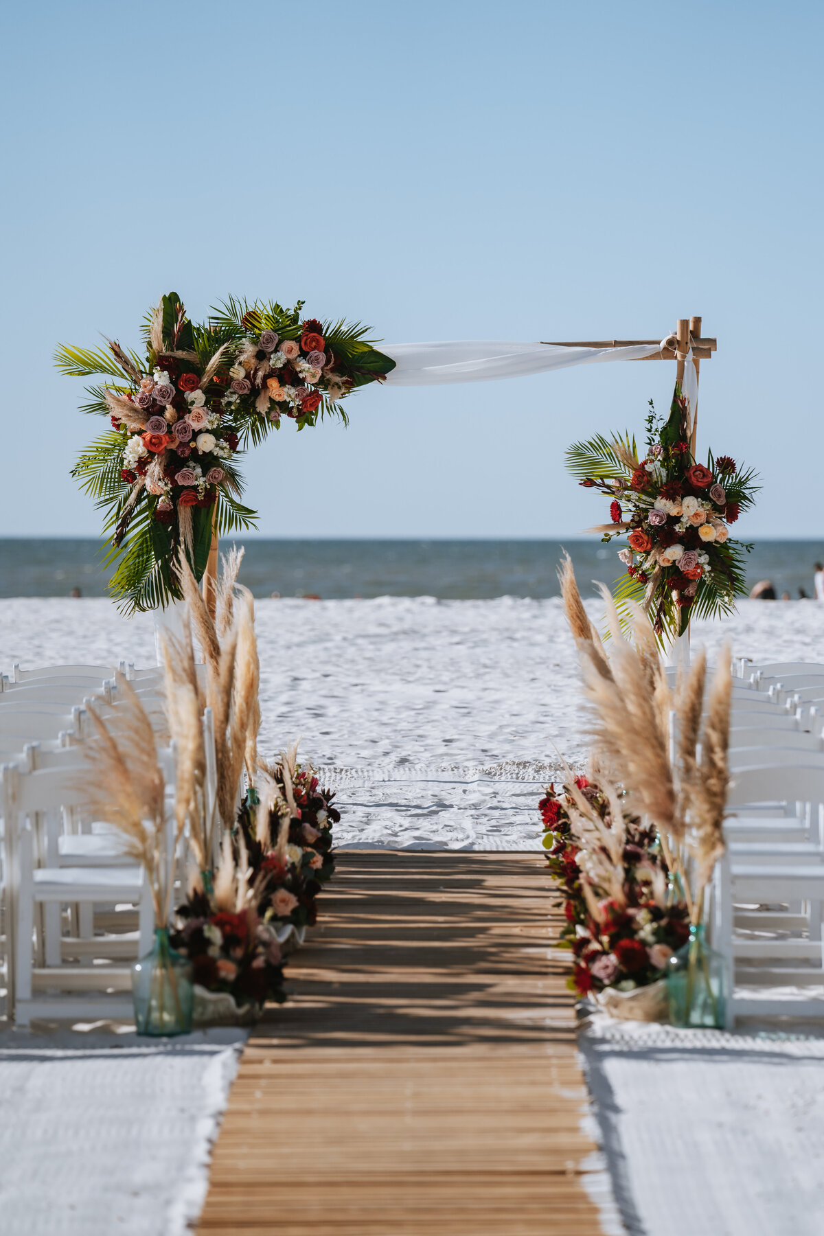 wedding arch and floral decor on st pete beach in florida