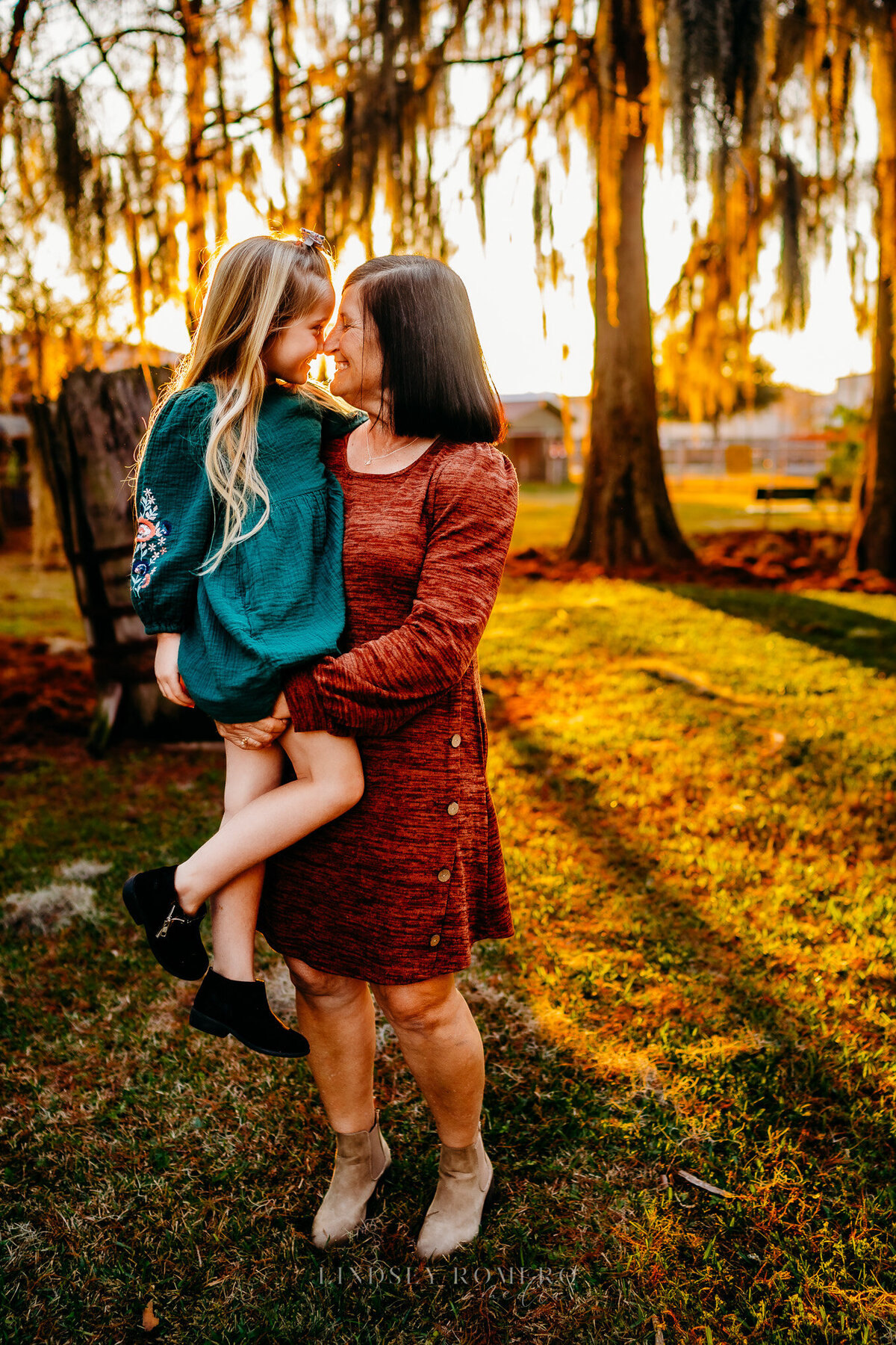grandma and granddaughter pose at sunset in Patterson, la