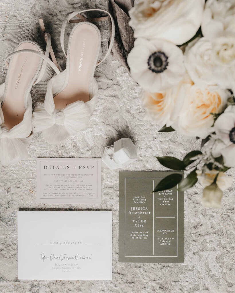 Wedding details, olive and ivory invitation suite styled by Melissa Dawn Event Designs, a unique and modern wedding planner based in Calgary, Alberta. Featured on the Brontë Bride Vendor Guide.