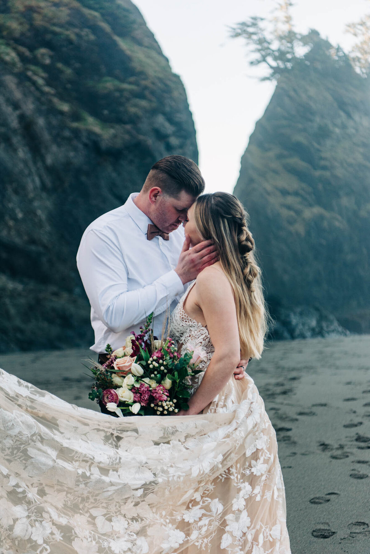 Quiet moment elopement on Secret Beach
