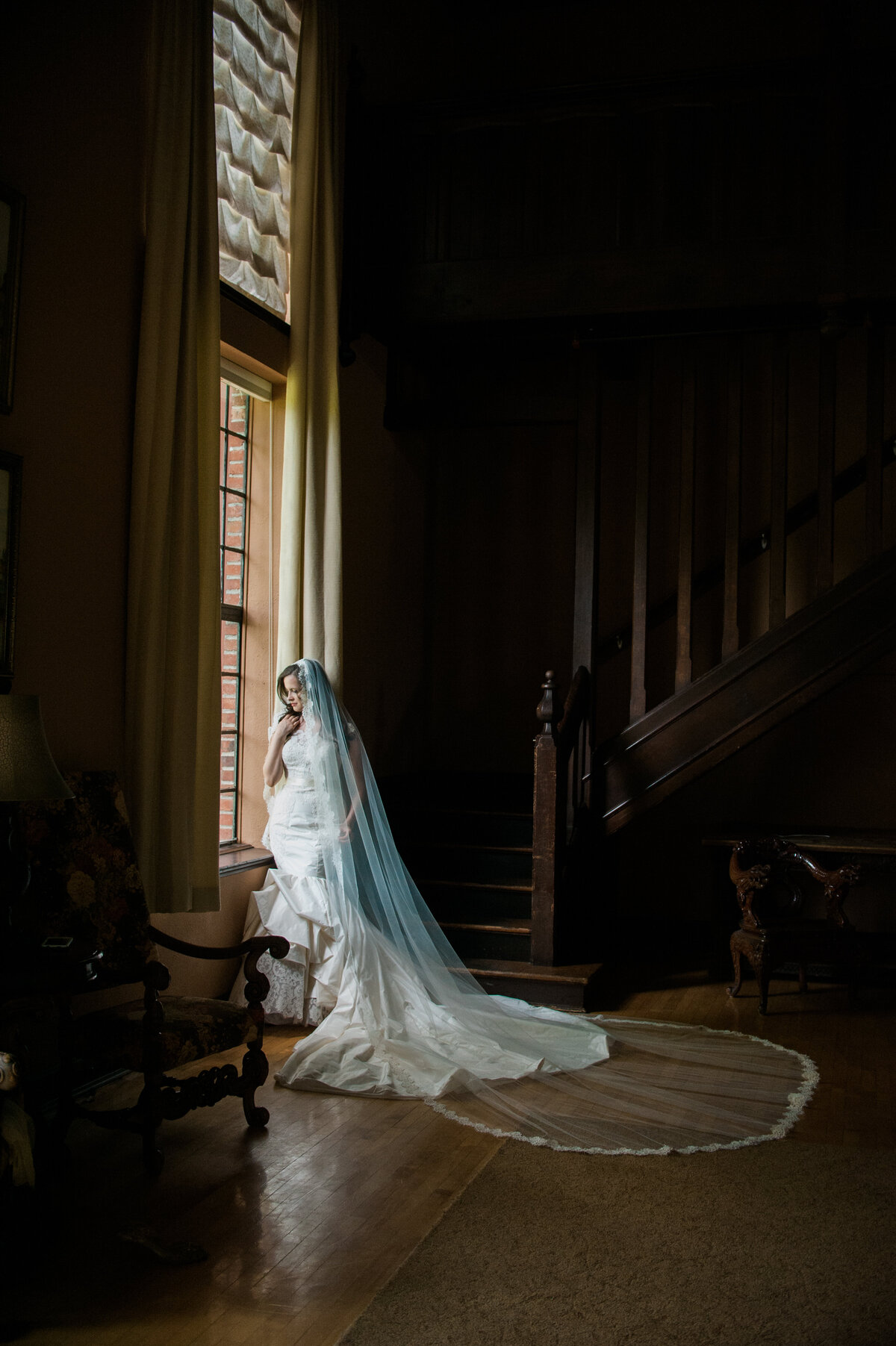 luxury bride at annie wright school in tacoma washington posed in a couture gown
