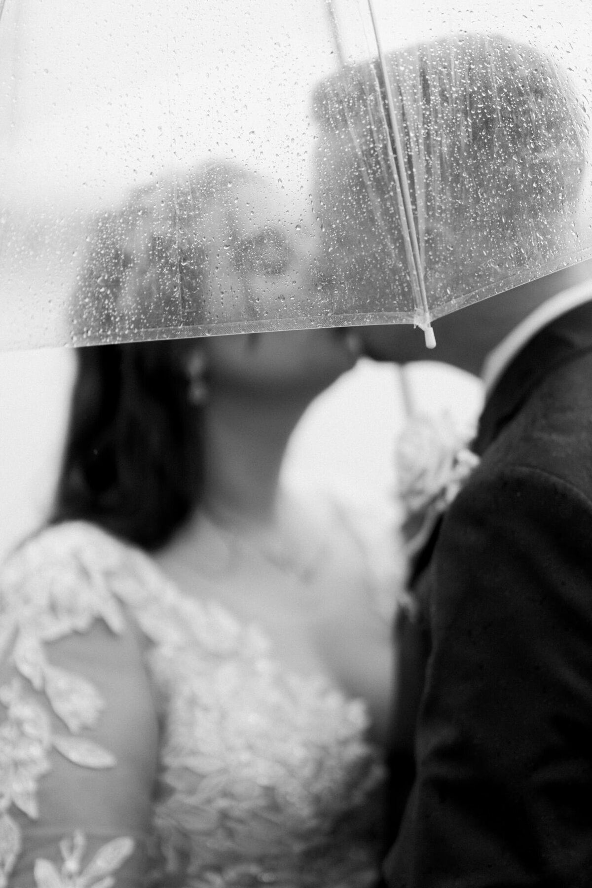 Rainy day bride and groom portrait in Thousand Islands NY