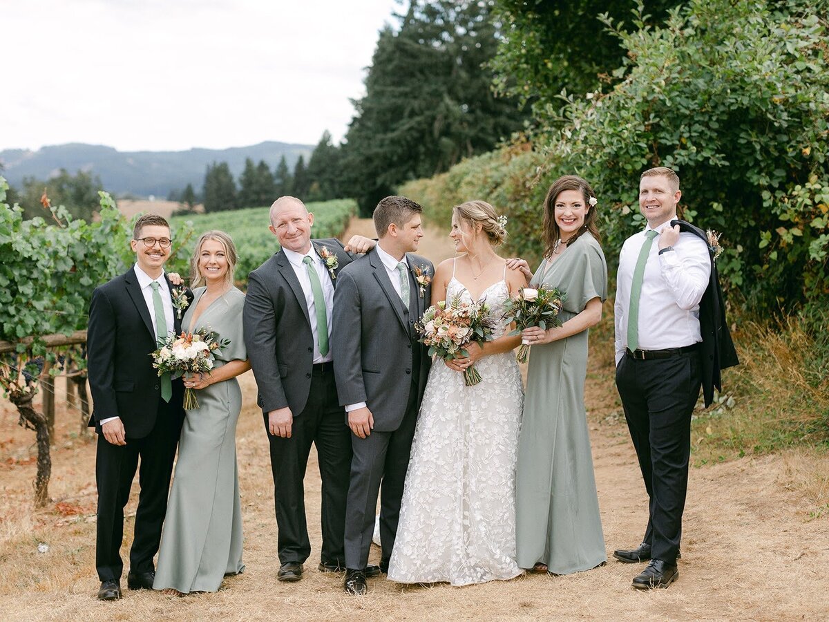 Wedding party with their bouquets and boutonnieres.