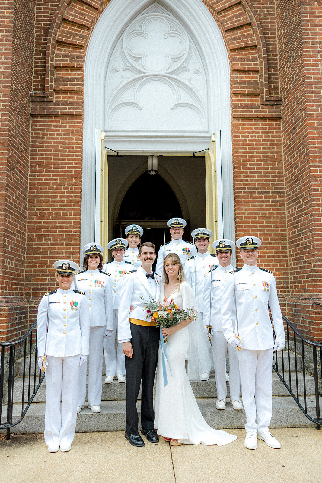 Bride and groom with navy wedding party