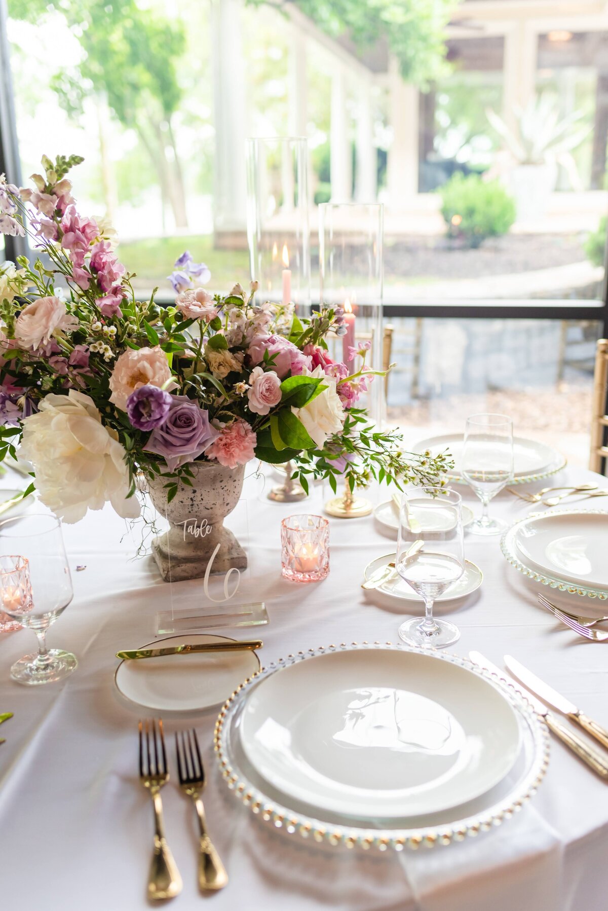 Spring flower wedding centerpiece gold place setting