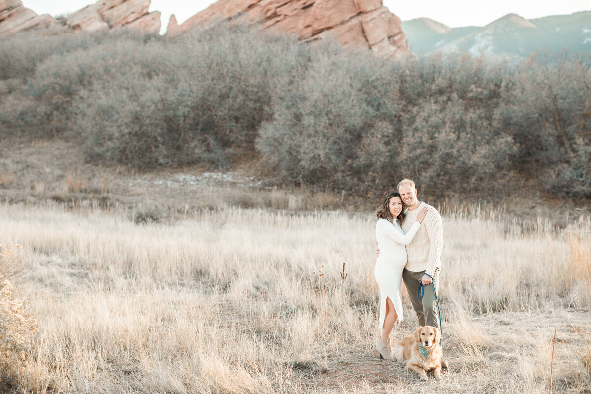 A pregnant mom and her husband during golden hour in Denver