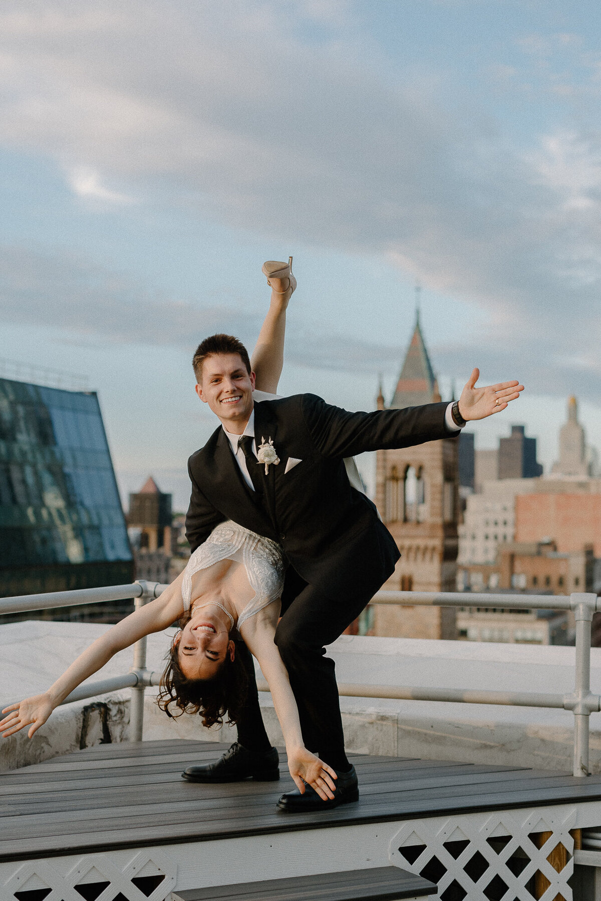 bride and groom on roof