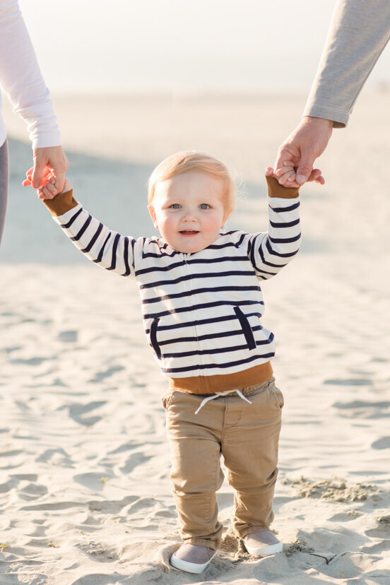 baby-holding-parents-hands-Coronado-San-Diego