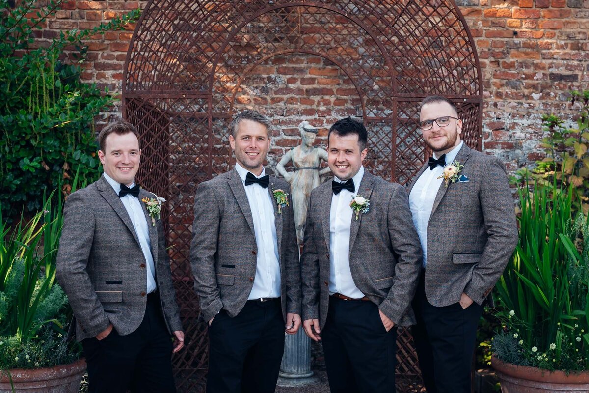 cotswold-wedding-photographer-groom-with-groomsmen