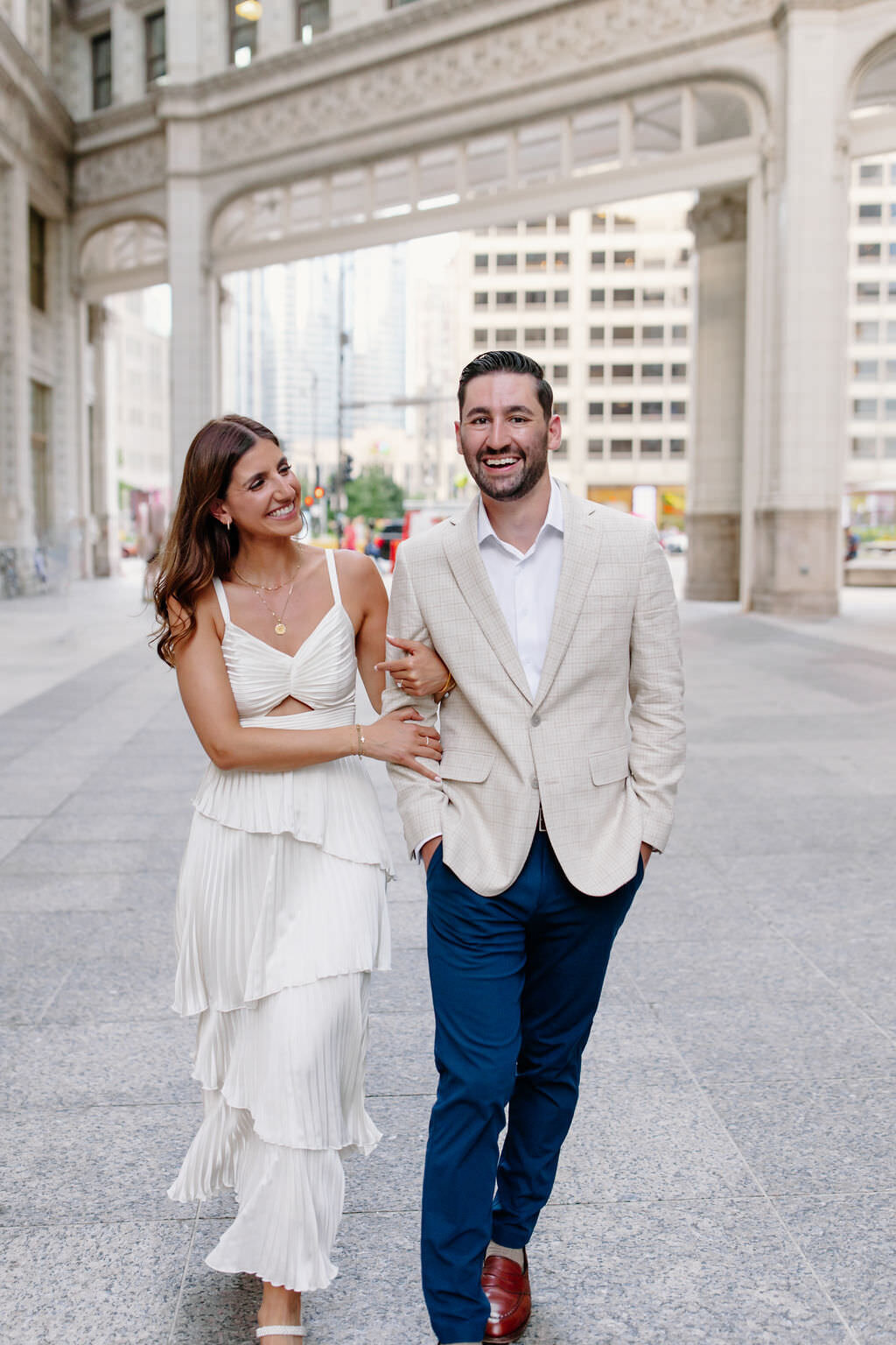 An engagement photography session at The Wrigley Building and North Ave Beach in Chicago, Illinois - 21