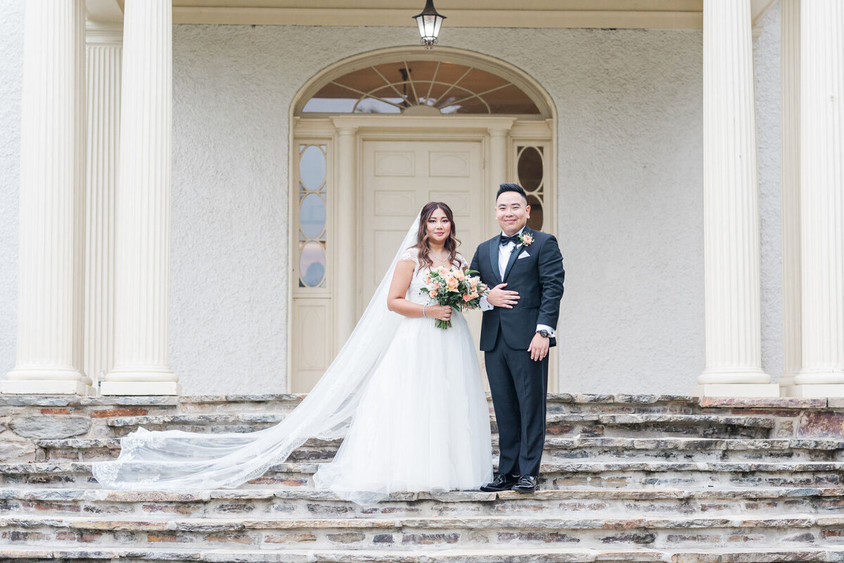Portrait of bride and groom in the stairs