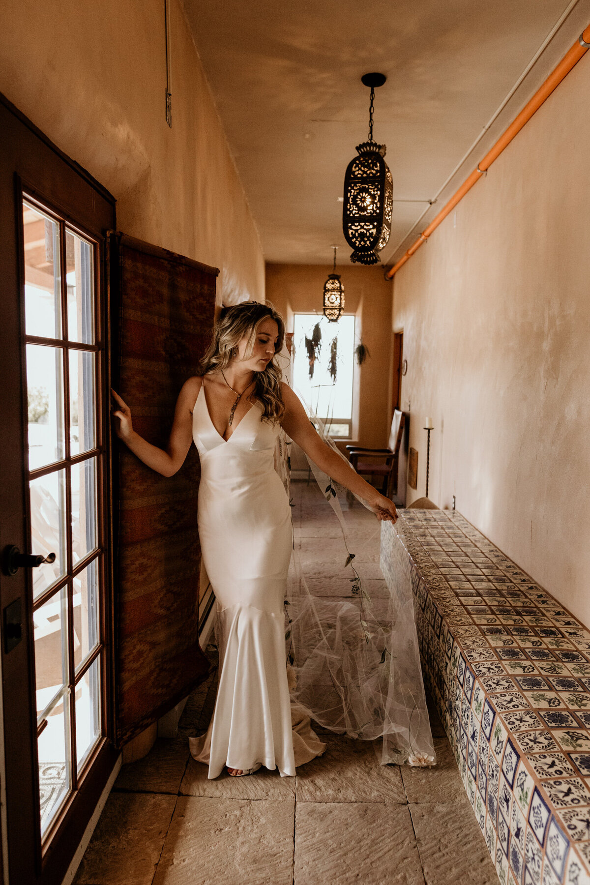bride standing in a southwestern hall in Santa Fe, New Mexico