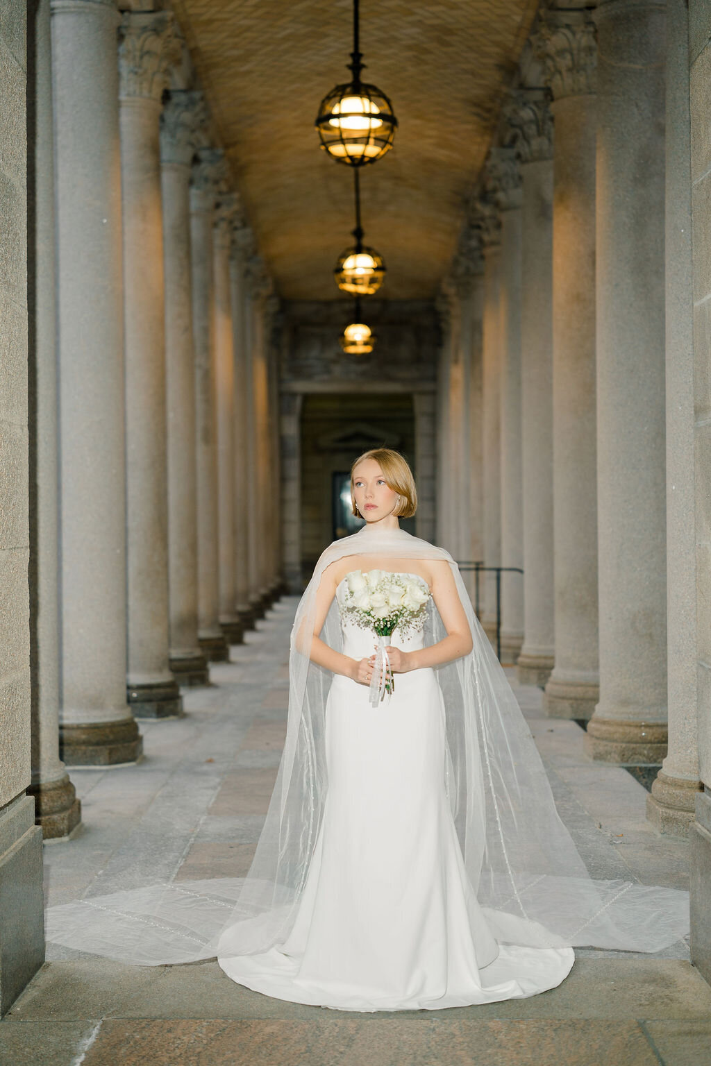 Cathedral length bridal scarf adorned with delicate pearl details for a timeless look
