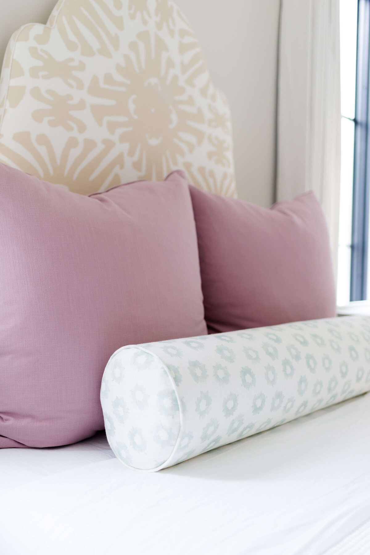 oyster creek studios building belt new build ivory pattern bed frame with pink and white bedding in bedroom