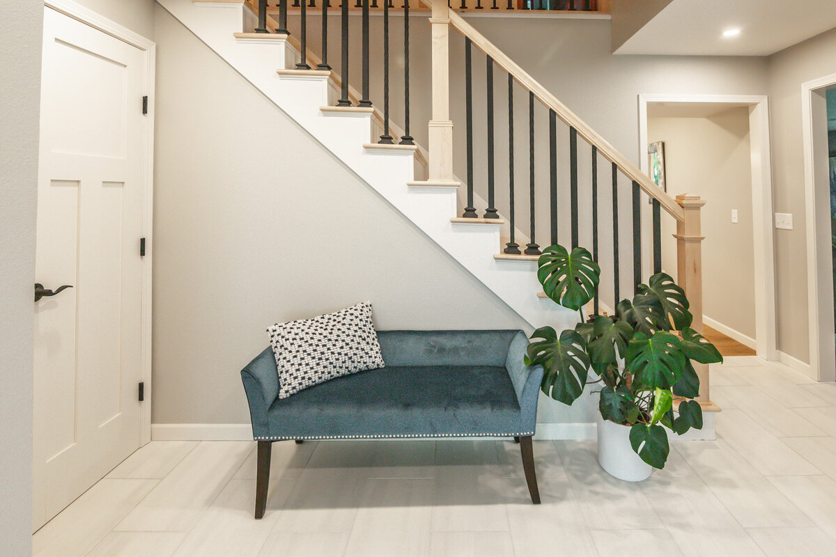 blue couch in foyer
