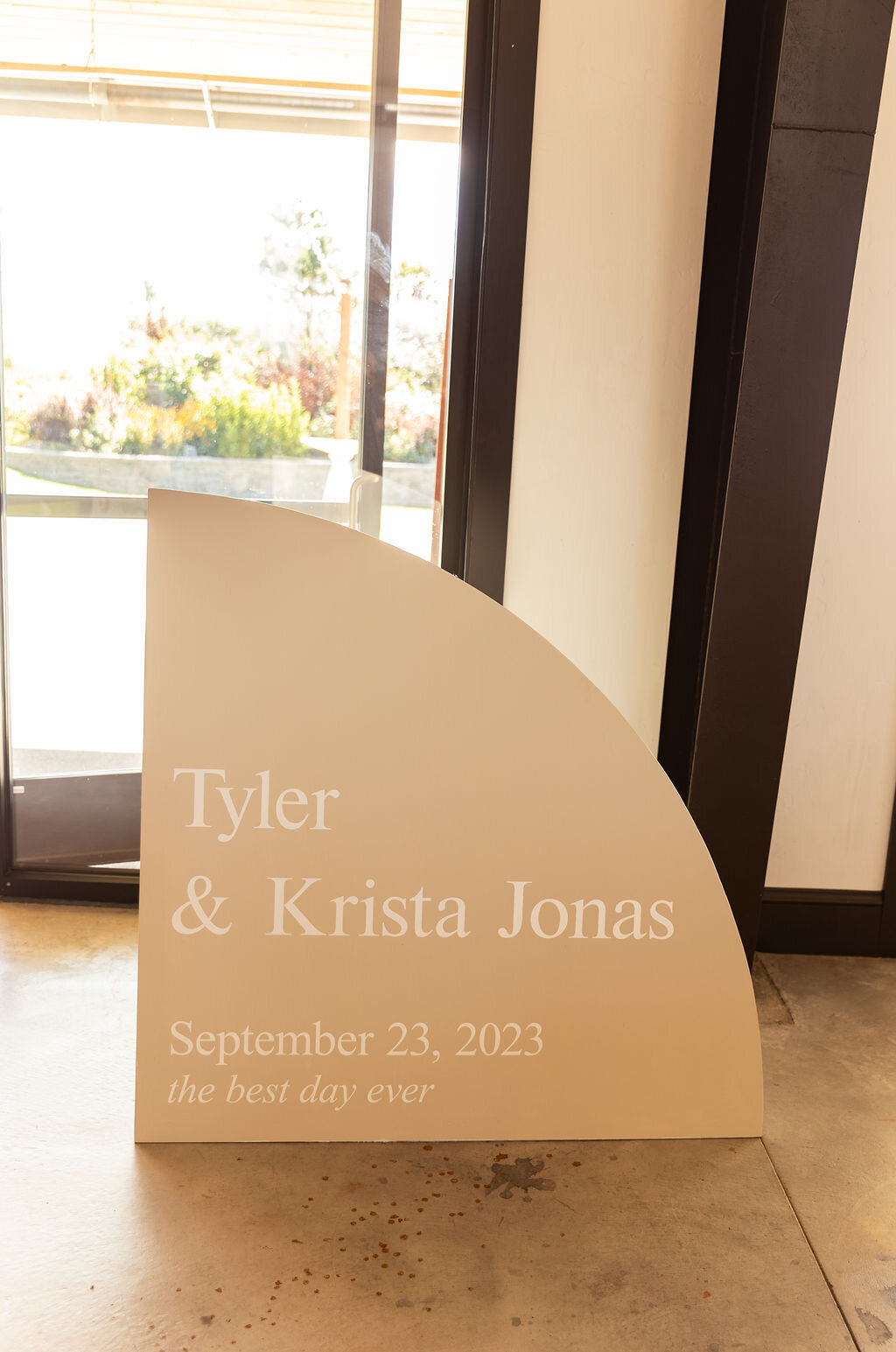 Tan wedding welcome sign.