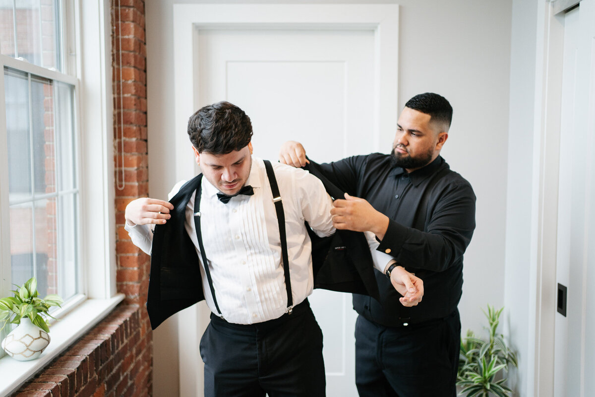 The Venues at the Factory wedding in New Hampshire with industrial modern details and candid moments.