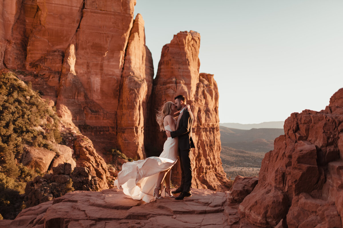 Emotional vows exchanged on Cathedral Rock overlook Sedona taken by Kollar Photography