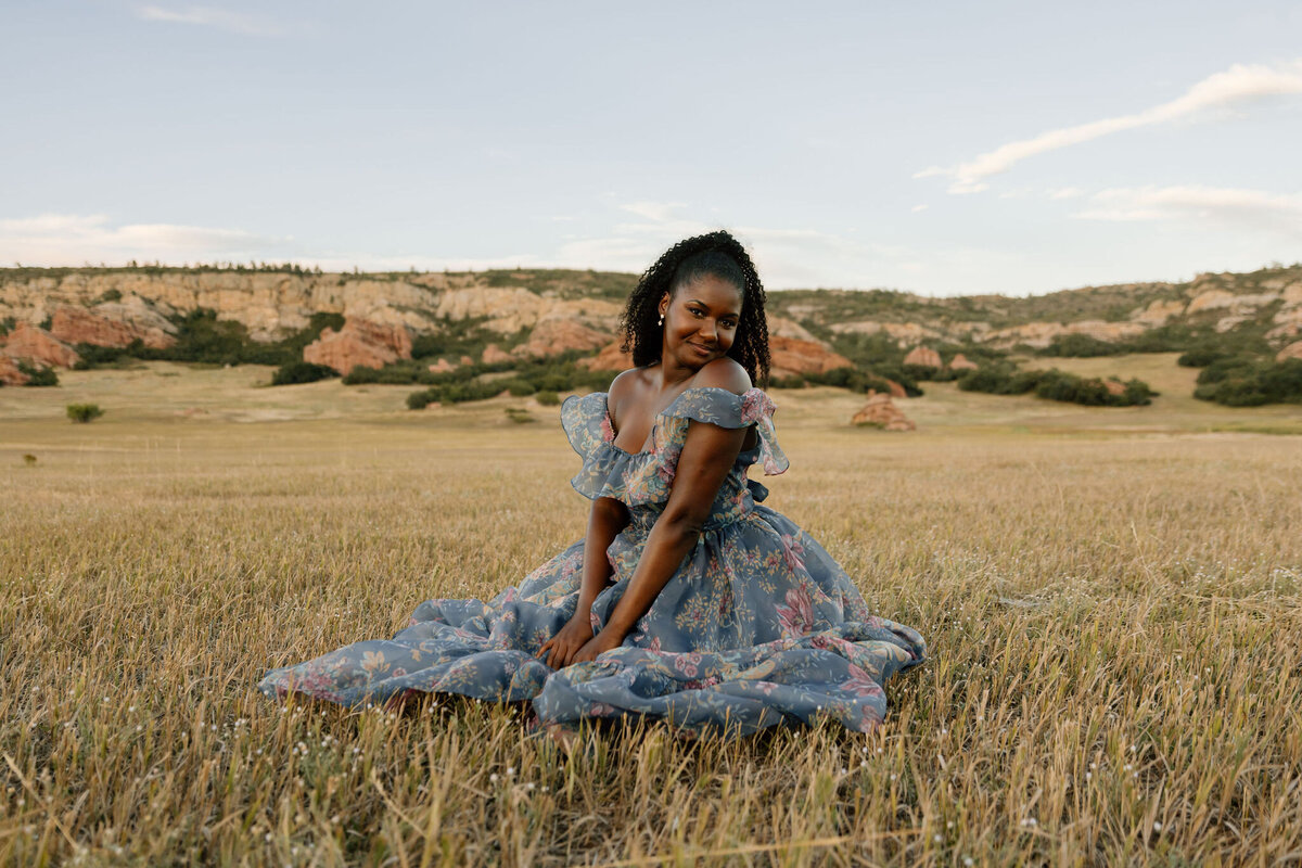 An outdoor photoshoot in the foothills near Denver, featuring wide open spaces, vibrant landscapes, and the adventure of a scenic Colorado backdrop.