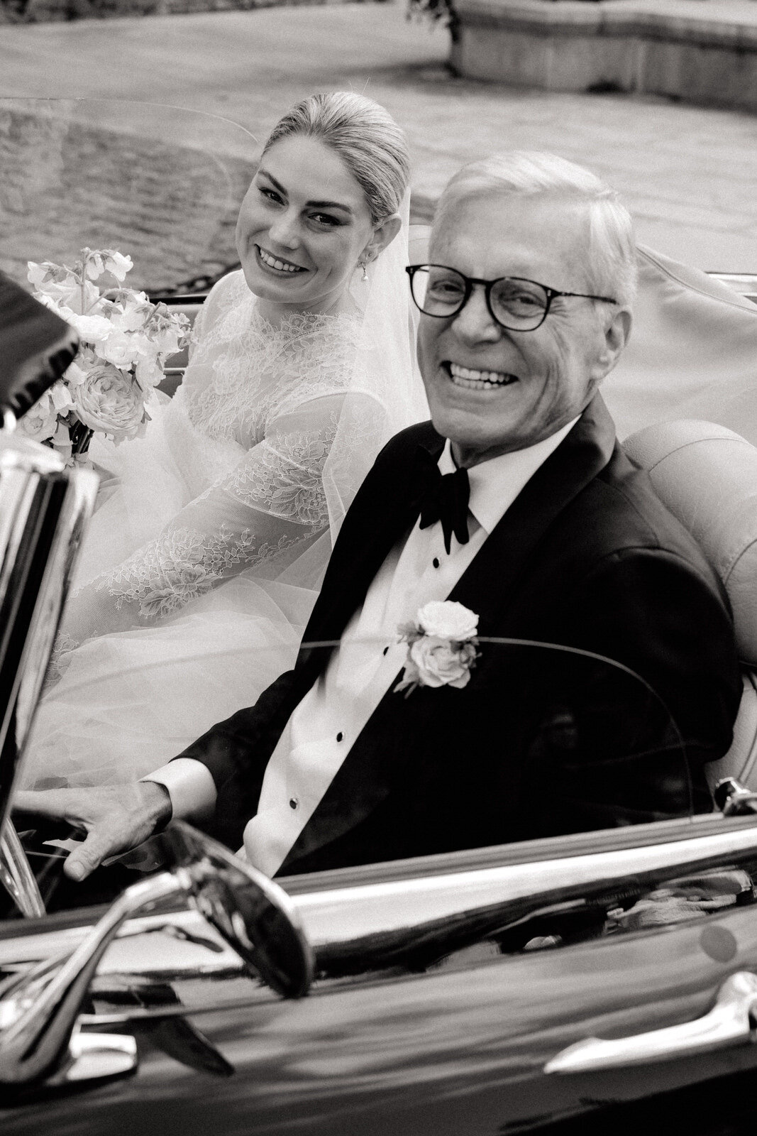 father and daughter in wedding car
