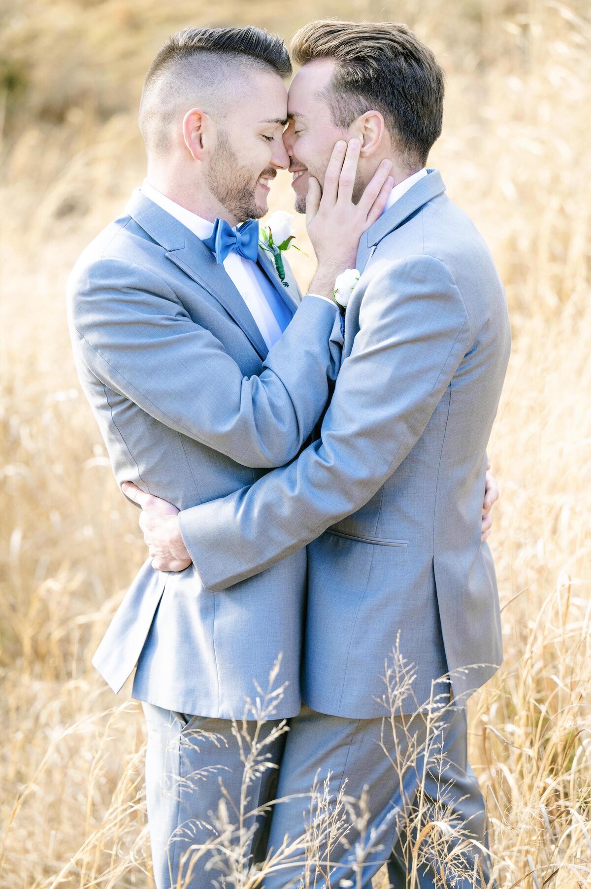 Grooms hugging