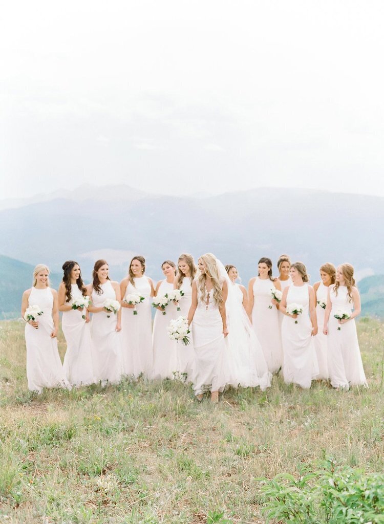 Bride and bridal party at a white mountain top venue