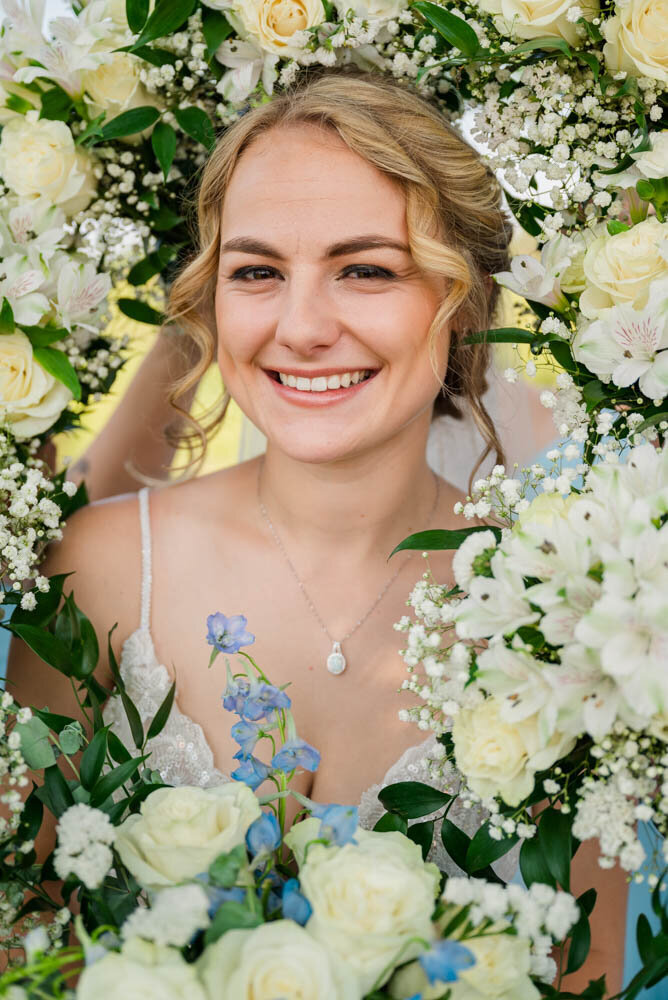 Bride-with-flowers-surrounding