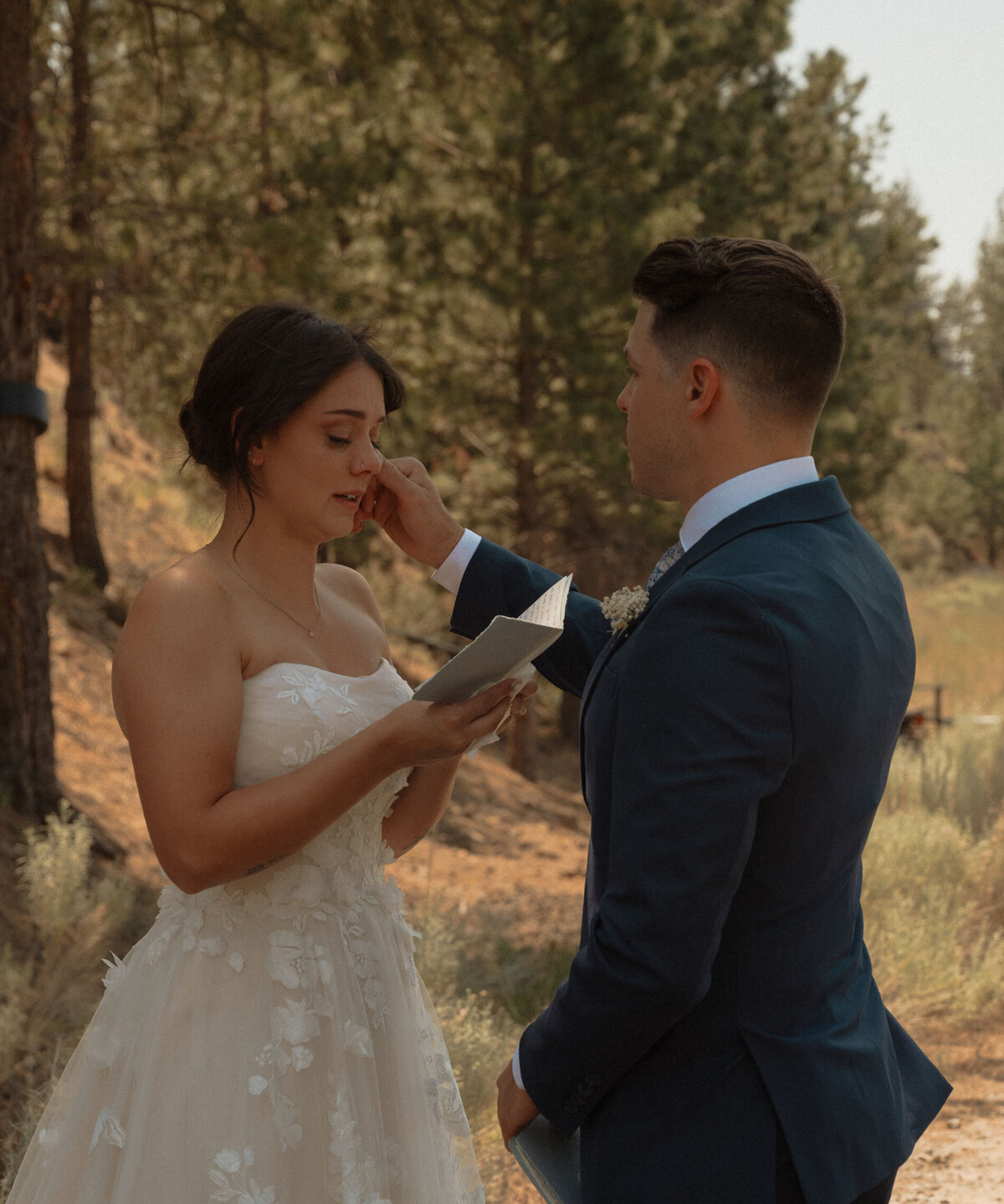 intimate moment of bride and groom exchanging vows in the central Oregon high desert