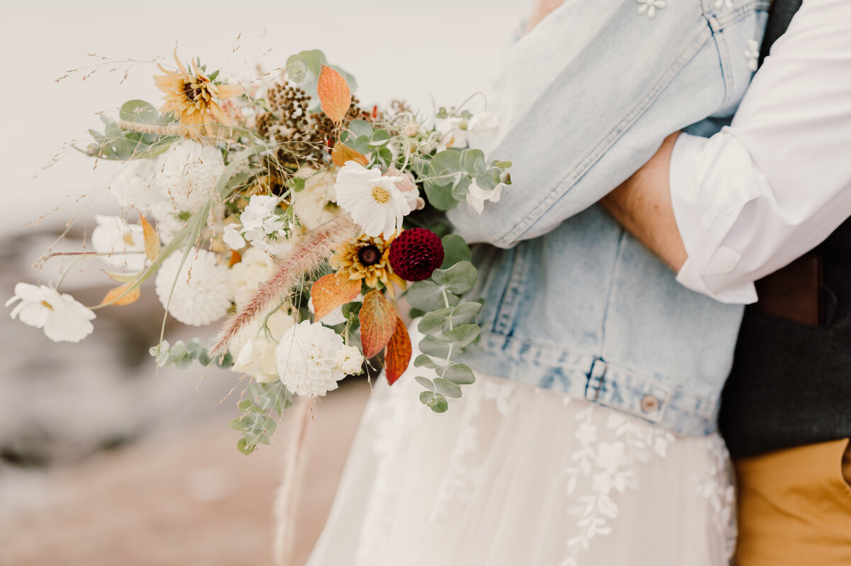 bride and groom cuddle up