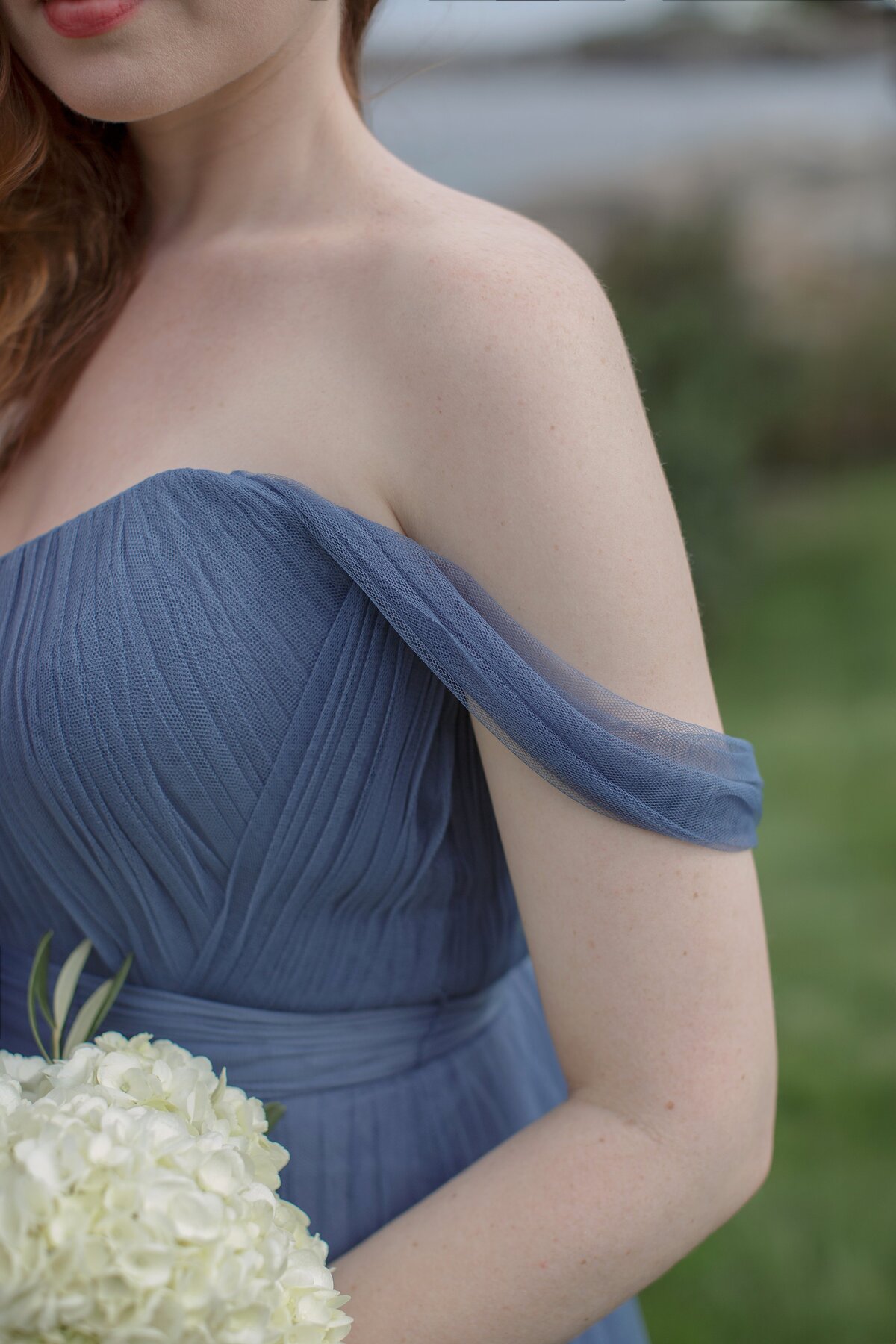Close up detail of baby blue bridesmaid dress