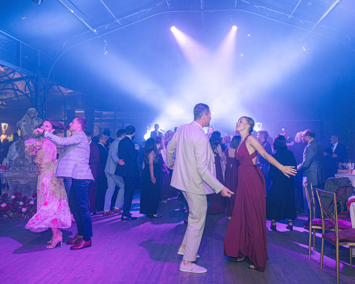 Guests dancing to live band at destination wedding on Lake Como