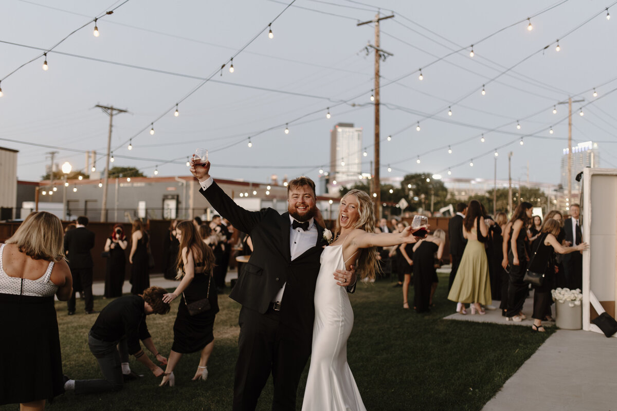 bride and groom smiling at their reception venue