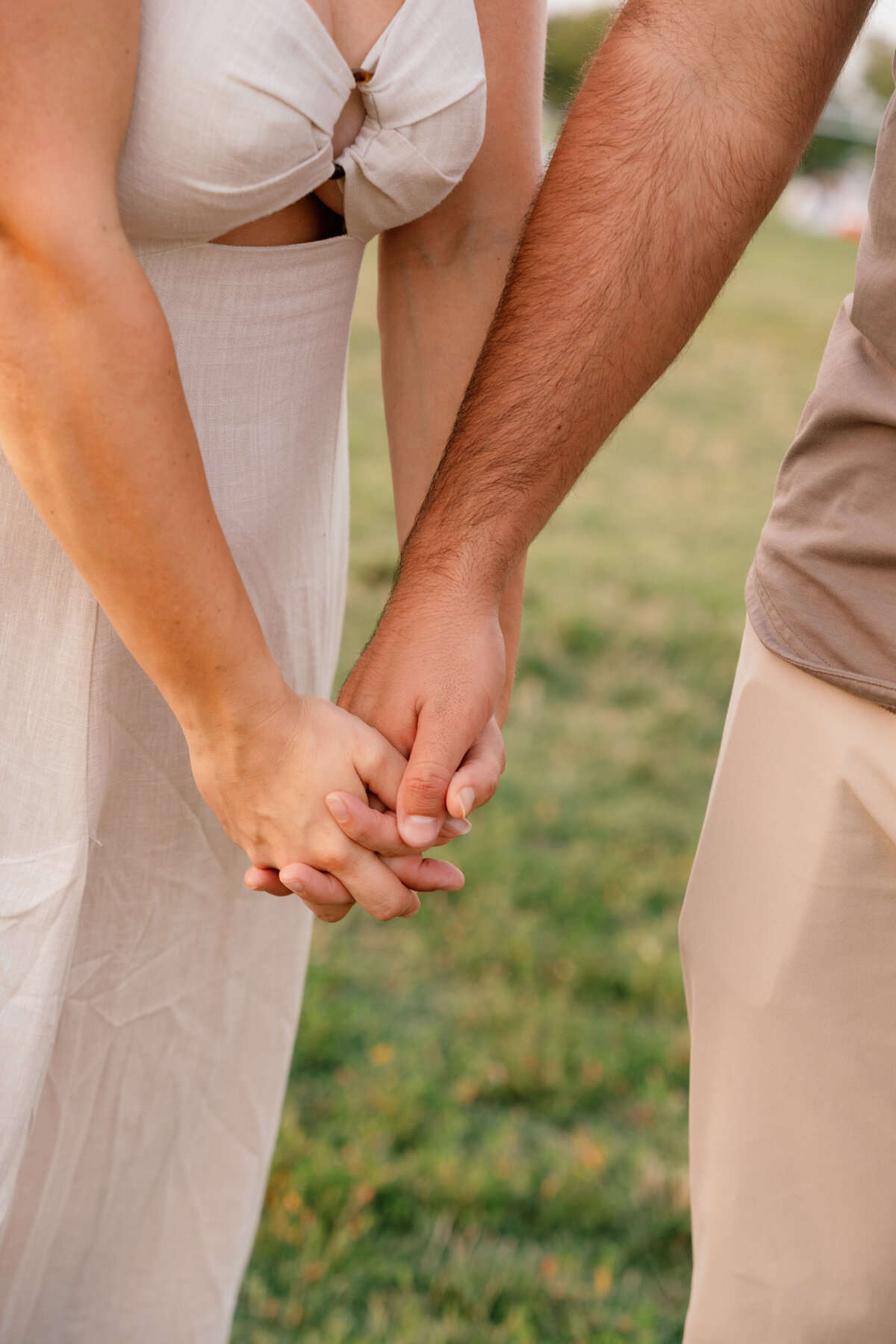 Close up of a couple holding hands