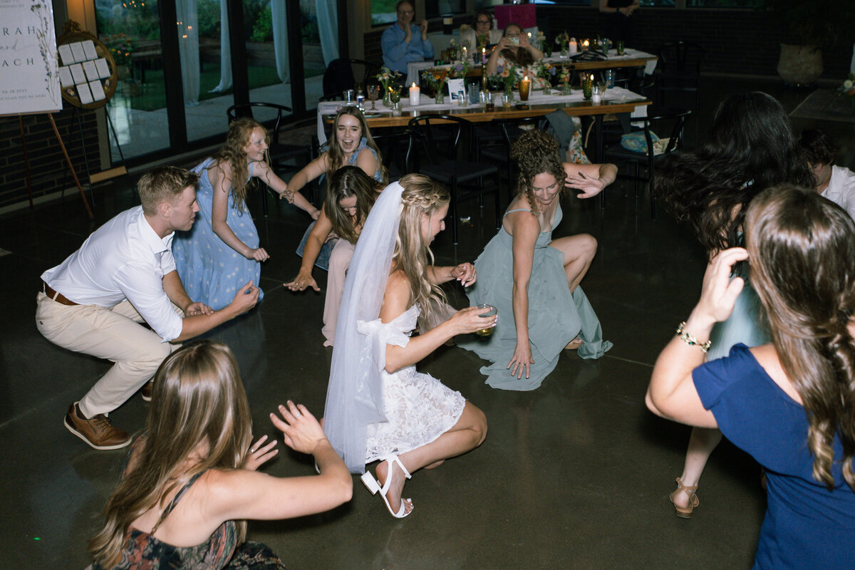 Tattooed couple during their alternative micro-wedding in Springfield, MO, photographed by Chelsea Stanford at Gillioz Theatre