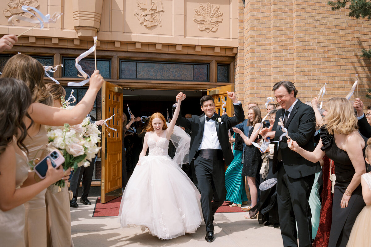 bride and groom leaving church at The Broadmoor Resort in Colorado Springs, Colorado