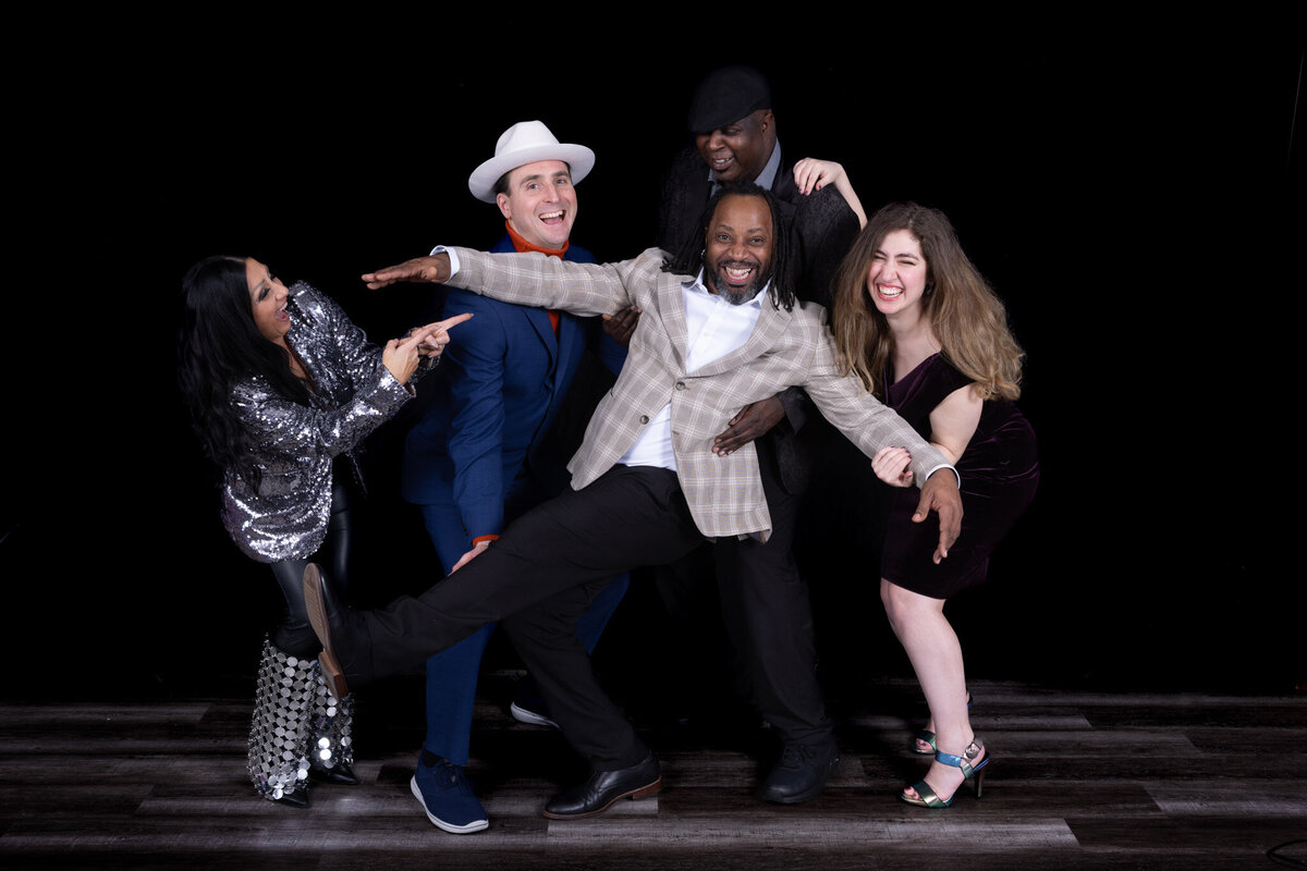 Charizma Entertainment’s Chicago DJ team posing together with fun, high-energy personality