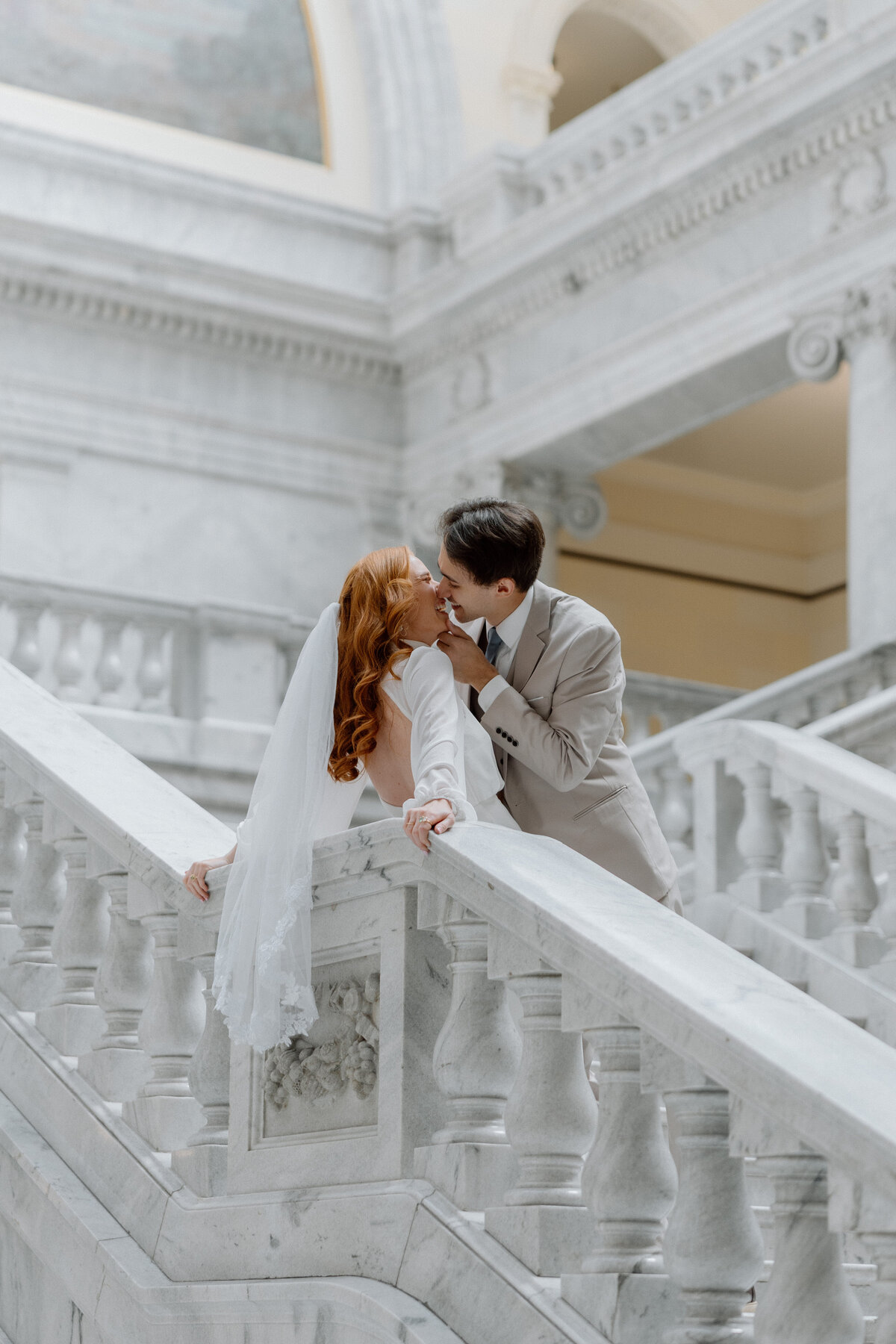 Couple elopes in the Utah State Capitol in Salt Lake City, Utah. Indoor elopement location in U.S. 
