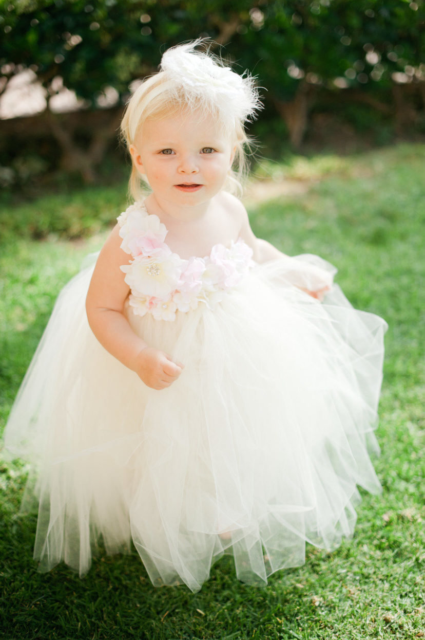 flower girl in a fluffy white dress
